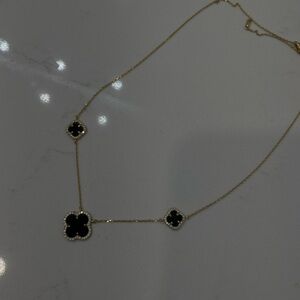 Elegant Gold and Black Clover Necklace